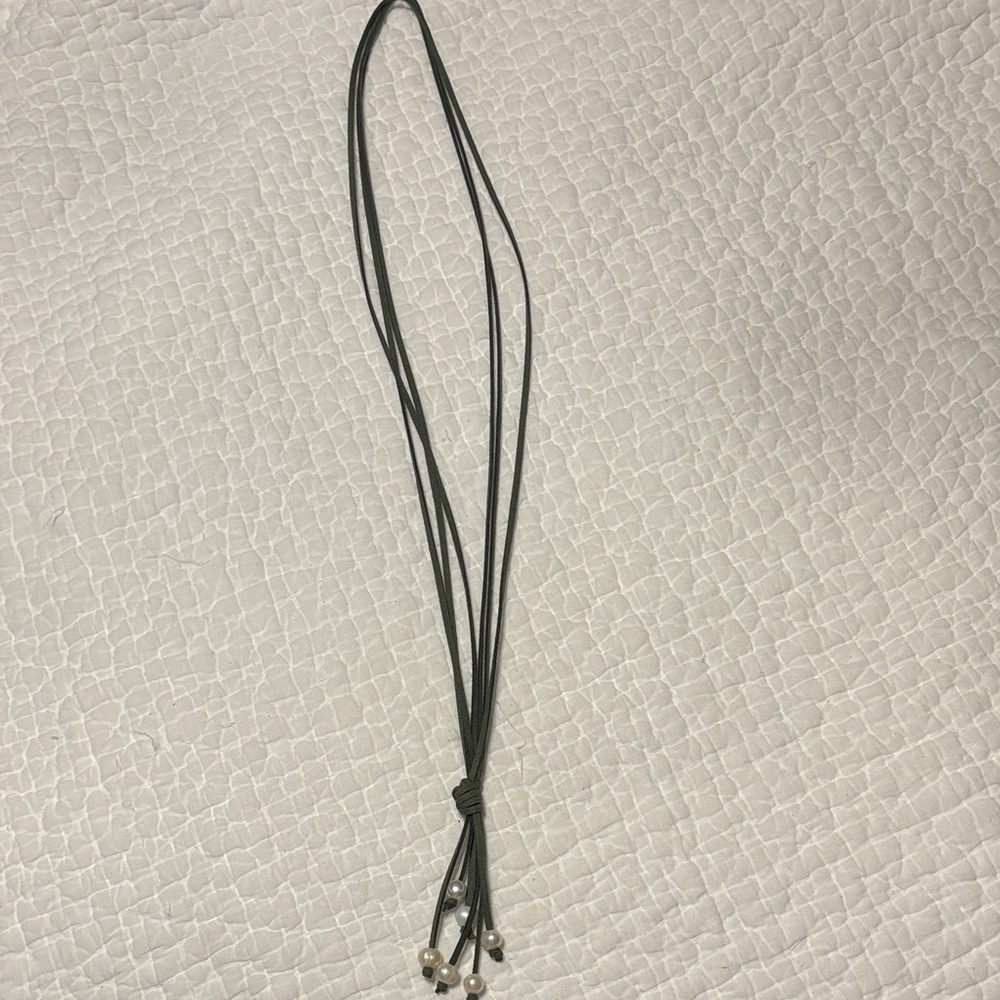 Leather strap (green) 22” long necklace with pearls.